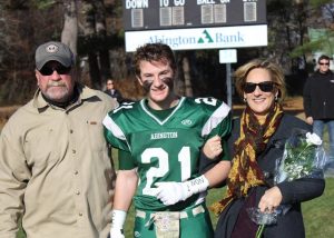 Dave and his proud parents on senior day.