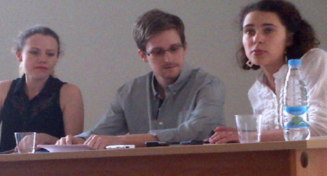Edward Snowden, center, is shown meeting with activists at an airport in Moscow, Russia, in July 2013. 