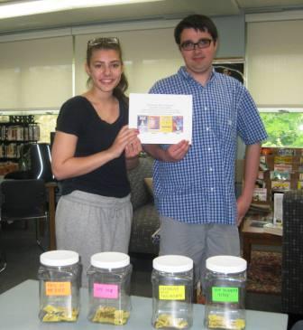 Contributor Katie Rust and Associate Editor Ian MacLeod  hold the raffle flyer after the winning tickets were drawn. Winners were Mrs. Farias - The Vans Warped Tour, Mrs. Ryan - Les Miserables at Company Theatre, Katie Griggs - Monument Tour, Amanda Beaver - Panic at the Disco