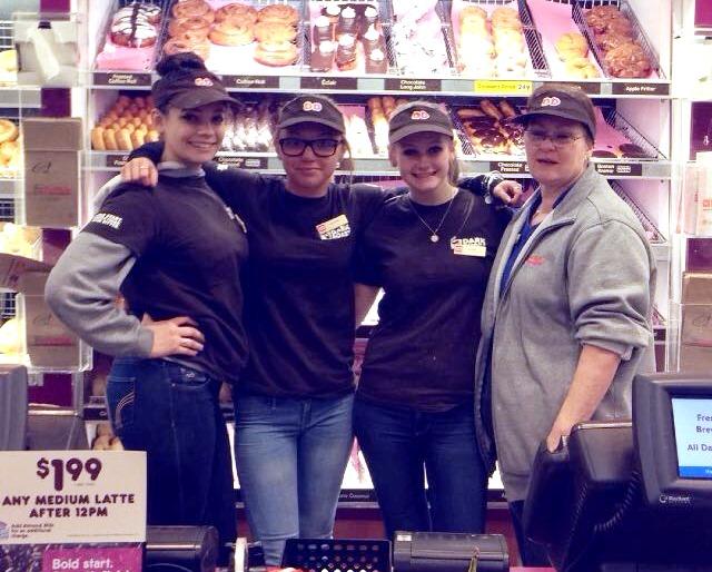Kristina Sullivan (second from left) and three of her coworkers at Dunkin Donuts. (Courtesy Kristina Sullivan)