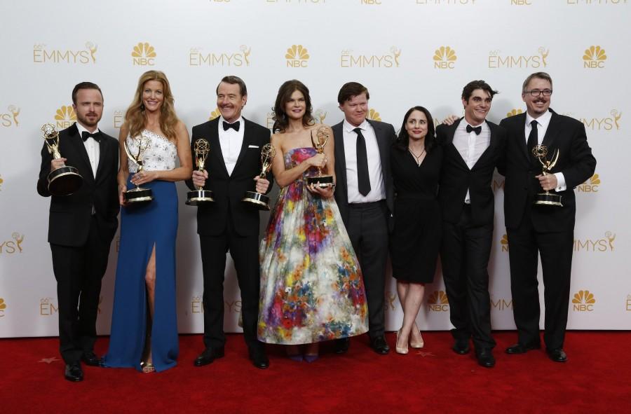 The cast of Breaking Bad and Vince Gilligan, right, backstage at the 66th Annual Primetime Emmy Awards at Nokia Theatre at L.A. Live in Los Angeles on Monday, Aug. 25, 2014. (Ricardo DeAratanha/Los Angeles Times/MCT)