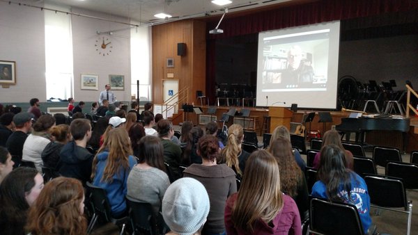 Students attend the Skype experience with author Kenneth C. Davis.