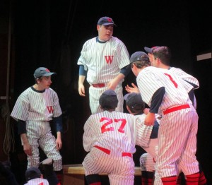 Riley Morrison leads the Senators in The Game in the Drama Clubs production of Damn Yankees.