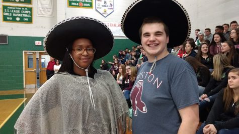 Lisa Pinto 18 and Frazer Toomey 19 introduced Mariachi Estampa de America and encouraged students to dance and sing along during their performance at Foreign Language Week.