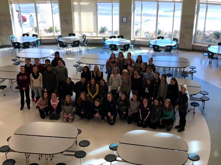 Abington High School Peer Leader Members pose for a group photo after school in the Middle School cafeteria in February of 2018. 