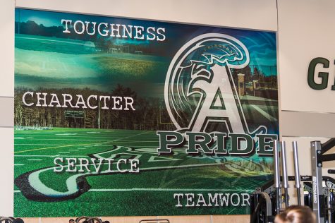 The mural hanging in the new weight room at the co-located middle/high school highlights Abington Pride.