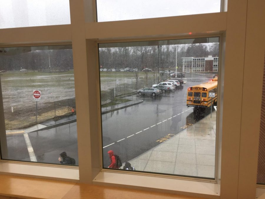 Students+Leaving+in+Rain