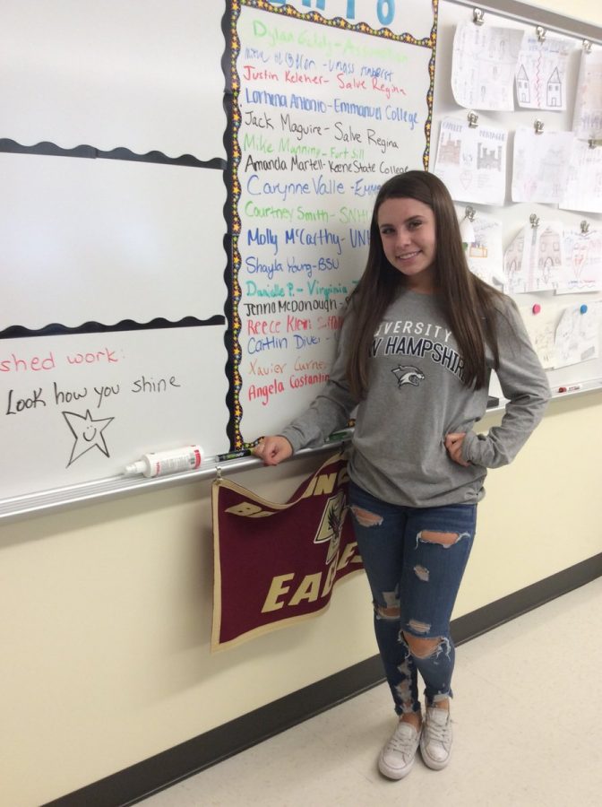 Molly McCarthy (18) showing off her college insignia on Decision Day