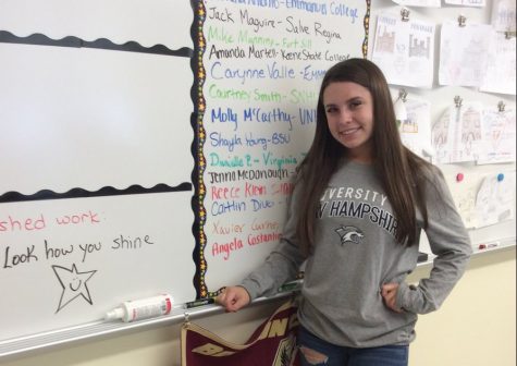 Molly McCarthy (18) showing off her college insignia on Decision Day