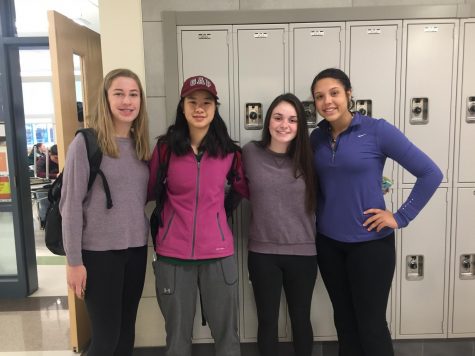 Students wear purple to support GSA, featuring Ailey Riddick, Vianne Shao, Abbey Odell, and Corin Mahan. 