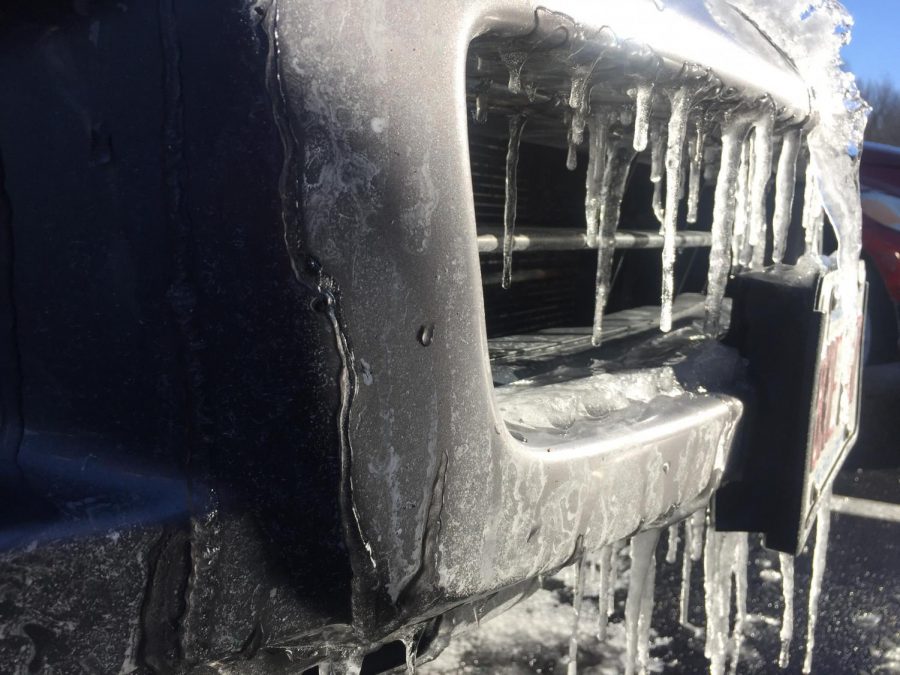 A car in the Abington High School student lot was frosted and frozen with icicles on January 22, 2019. 
