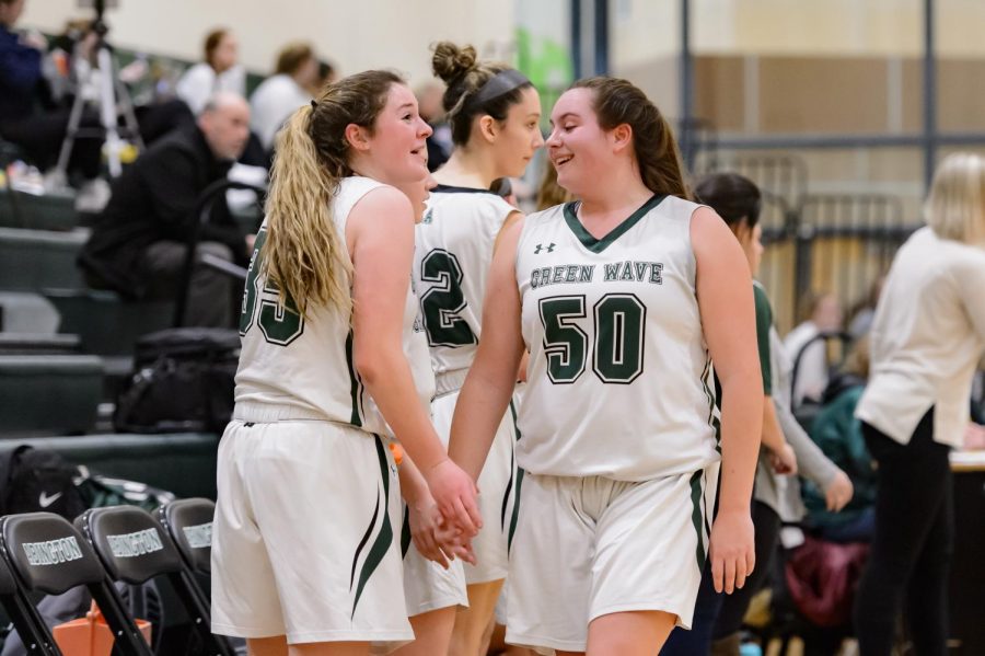 In the January 27, 2019 game against the Hull Pirates, Abington High School senior captains Kristyanna Remillard and Madison OConnell engage in a lighthearted moment on the court.