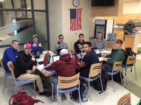 Seniors in period one English class enjoying breakfast in the Green Wave Cafe while doing classwork on their one-to-one devices. Photo taken September 25, 2018. From left to right: Justin Maskell, Craig OConnor, Ryan Doherty, Justin Murphy, Tommy Tashjian, Christian Lebossier, Michael Boyle, Tony Dao, and Bryson Andrews (back to).