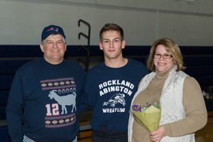 Tommy Tashjian and his parents recognized during the Rockland/Abington senior night, 2019, at Rockland High School.