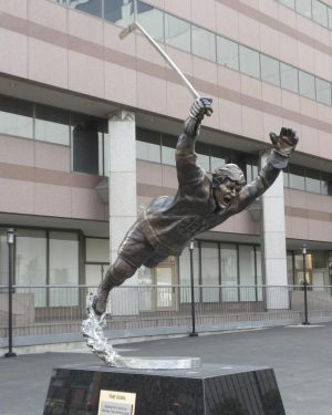The Goal statue of Bobby Orr outside TD Garden stands as a memory from the last time the Bruins and Blues met.