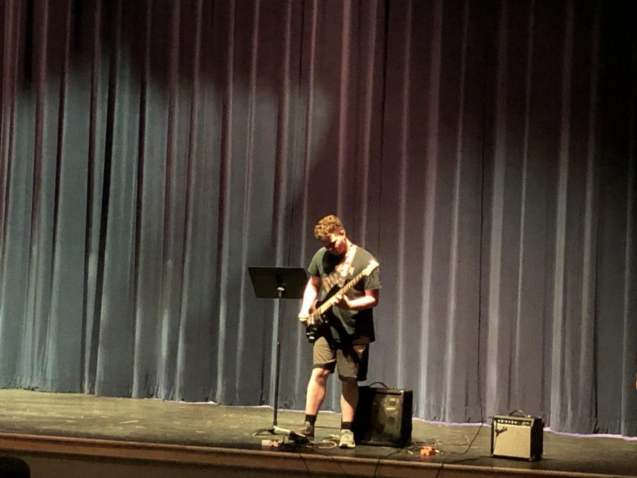Josh Whitman, a freshman at Abington High School, performs at Open Mic Night on May 8, 2019