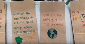 Students at Abington High School decorated paper lunch bags with positive sayings for the Soupman project. September 2019.