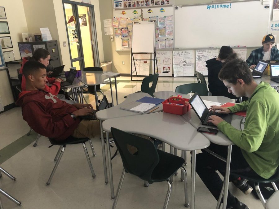 On Friday, October 18, 2019, students in Abington High Schools Journalism/Media Class write reports after conducting research on Fake News. Far left: Senior Cam Curney (foreground) and senior John Mueller (behind Curney). Far right: sophomore Chris Lussier (foreground) with senior Sean Moran (rear).