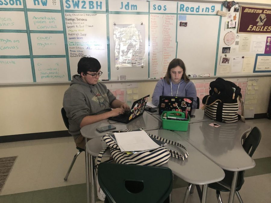 Rob Tashjian and Kathryn Sage, seniors at Abington High School, search for examples of Click Bait on October 18, 2019 in their Journalism/Media class. 