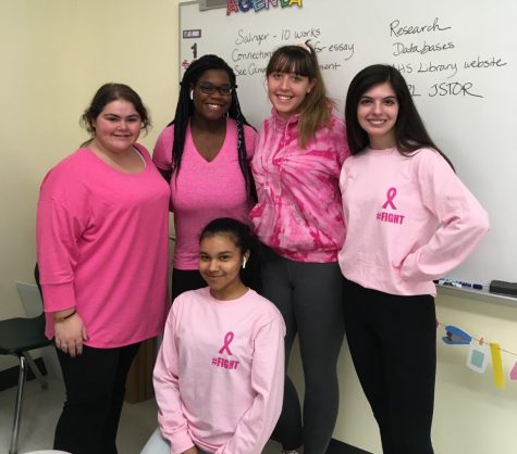 During Breast Cancer Awareness week at Abington High School, seniors Abbie Lyons, Linda Daye, Manda Riddick, Michaela                                                                                                    
Kane and Arlene Perez gather together in Mrs. McHugh’s English class on Friday,  October 25, 2019.