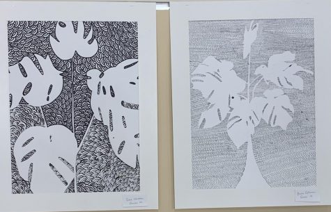 Black and white leaves from Ms. Poirier’s Drawing and Painting I class hang outside of her classroom during parent conferences on October 3-4, 2019.
