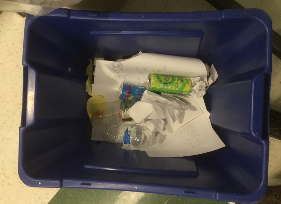 A recycle bin on October 8, 2019 in an Abington High School classroom shows plastic water bottles and contamination of paper products.