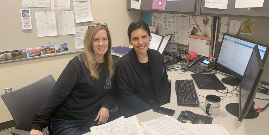 Guidance counselors Mrs. Ferioli (on left) and Mrs. Park (on right) pose in the guidance office on Friday, Janauary 17, 2020. They, along with faculty and students, are wearing black to support the Student Athletic Advisory Councils efforts of bringing awareness to ending cancer.