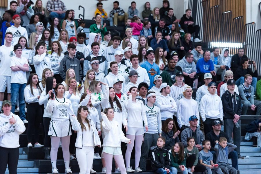 Abington fan section getting rowdy at the game against Cape Cod Academy at Taunton High School gymnasium on Saturday, March 7, 2020 