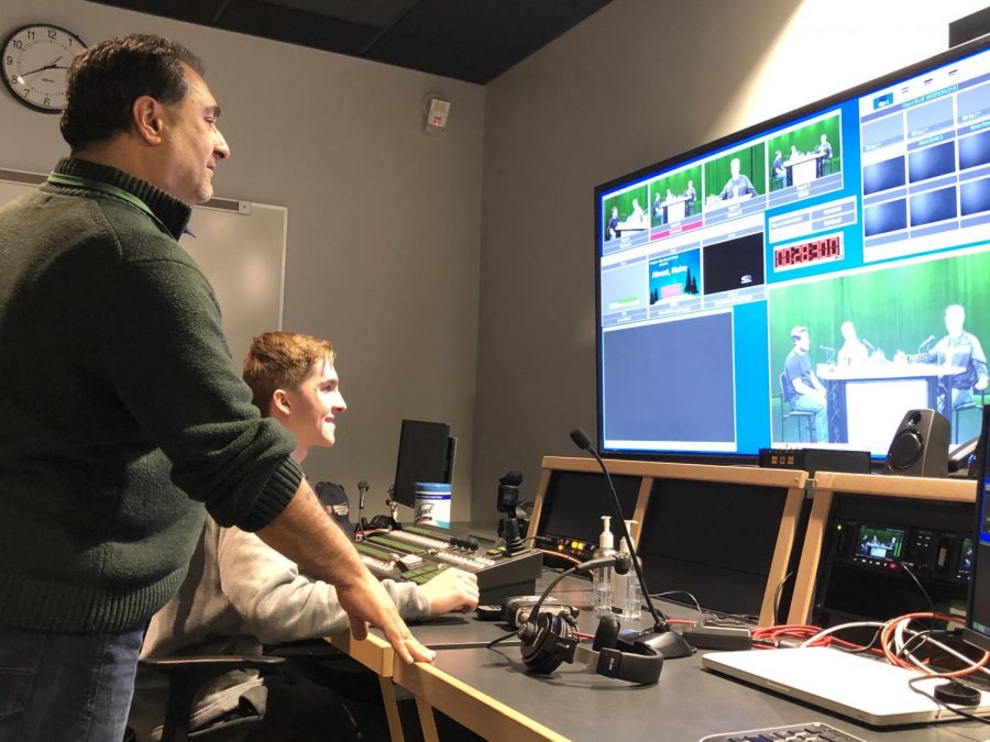 Mr. Kevin Tocci, Director of the Abington CAM assists AHS junior Derek Tirrell with the Weekly Wave program, hosted by Matt Lyons and Aaron Johnson, on Tuesday, February 4, 2020, when they had Jerry Thornton of Barstool Sports on as a guest