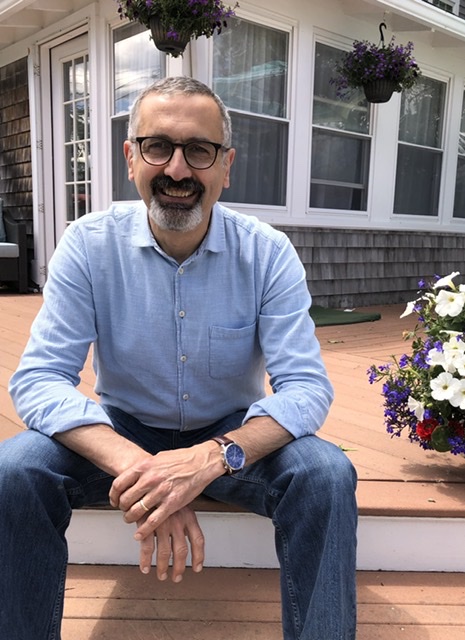 Mr. Mike DiRado sits on the steps of his house on June 1, 2020. This is his last year as the director of the Art department at Abington Public School.s