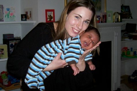 Ms Vicki Graham holds her adopted son TJ in December of 2007.