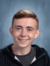 Michael Mikey Kearns, a member of Abington High Schools class of 2021, smiles for his yearbook photo in 2020 as a junior.