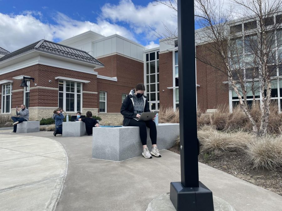 Senior Class President Rachel Barrett doing group work outside during her AP Literature and Composition class on April 30, 2021 at Abington High School. 