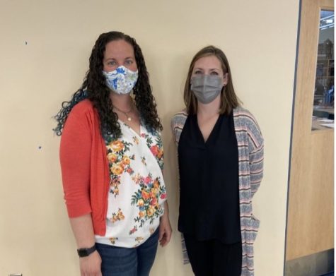 Art teachers Megan Kenealy (left) and Michelle Poirier outside of their second floor art classrooms at Abington High School in May of 2021.