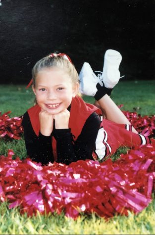 Abington High School Cheerleading coach Ms. Kristin Gerhart (seen here) has been cheering for most of her life.